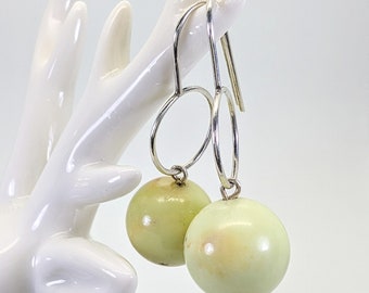 Statement silver ear hooks, light green lemon chrysoprase ball, minimalist earrings