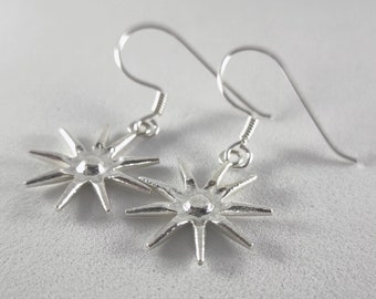 Silver statement earrings, star shape natural motif