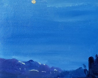 May include: A painting of a blue sky with a small yellow moon and a dark blue mountain range in the distance. The reflection of the moon and mountains can be seen in the water below.