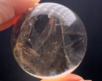 虹色のインクルージョン入り天然スモーキークォーツ水晶球（58mm