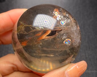 虹色のインクルージョン入り天然スモーキークォーツ水晶球（58mm