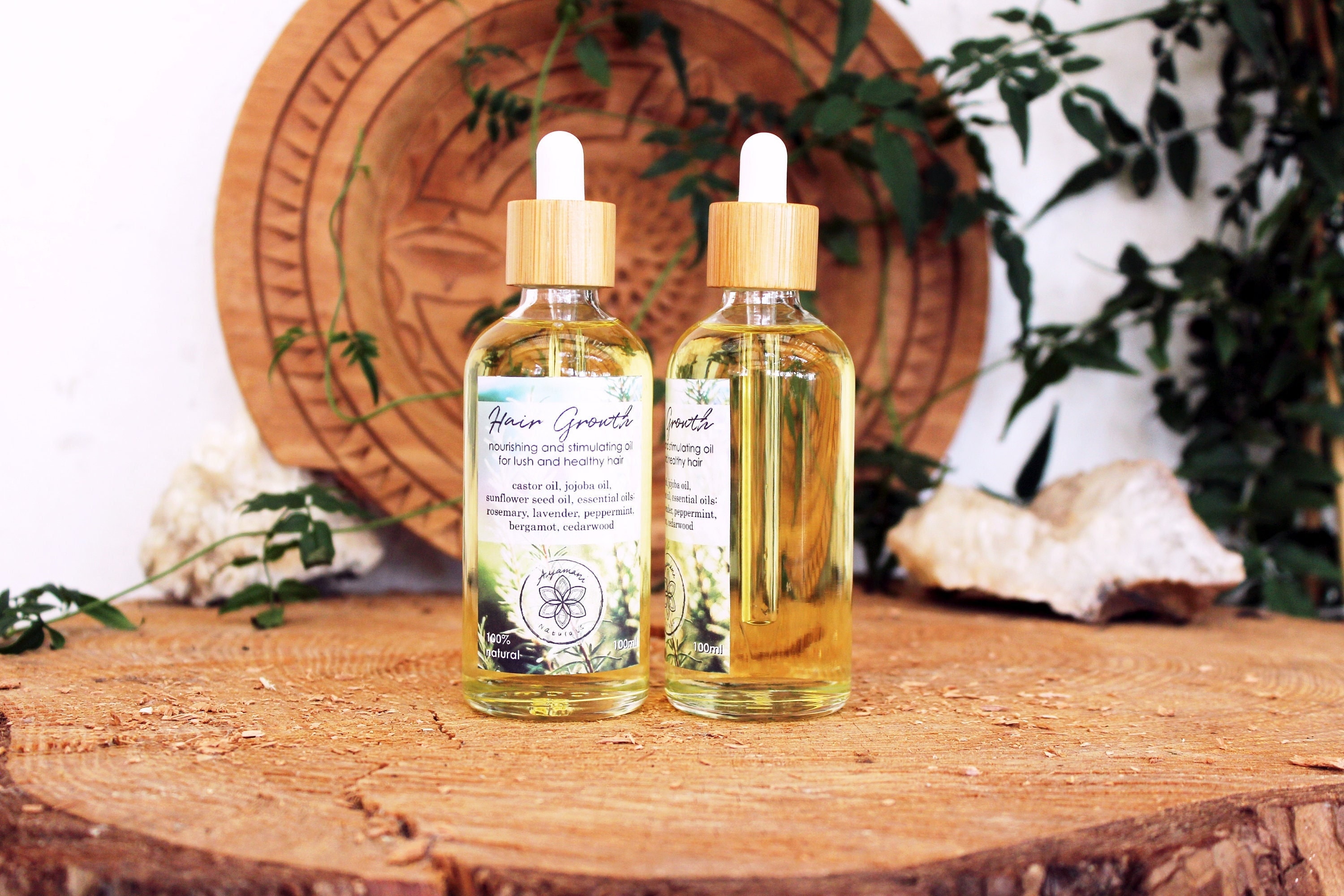 essential oil blend for hair growth rosemary lavender cedarwood peppermint in glass bottle