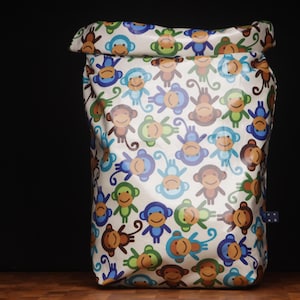 Tasche zum Krempeln aus Wachstuch mit Henkel