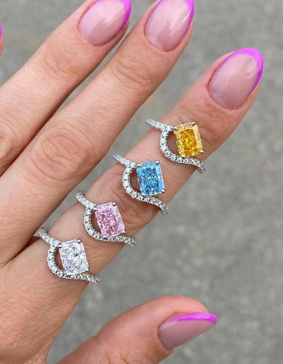 Wave ring shop with blue stone