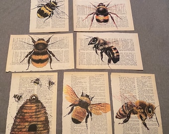 May include: Six vintage dictionary pages with black and yellow bee illustrations. The bees are drawn in a realistic style with intricate details. The pages are aged and have a yellowed tint.