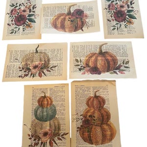 May include: Six printable digital images featuring watercolor pumpkins and floral arrangements on a vintage dictionary page background. The images are perfect for fall crafts, scrapbooking, and home decor.