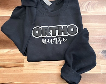 Sudadera negra Puff Ortho Nurse