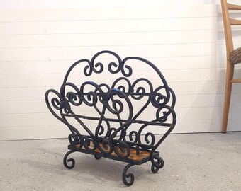 Vintage firewood rack wrought iron newspaper rack metal black solid heavy interior 1970s rustic cottage style country house