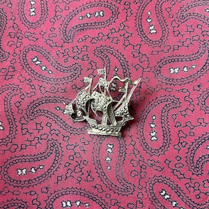 Vintage silver tone Spanish galleon ship brooch.