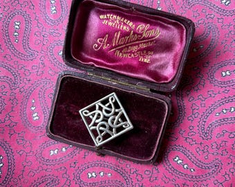 Vintage silver Celtic knot shield brooch.