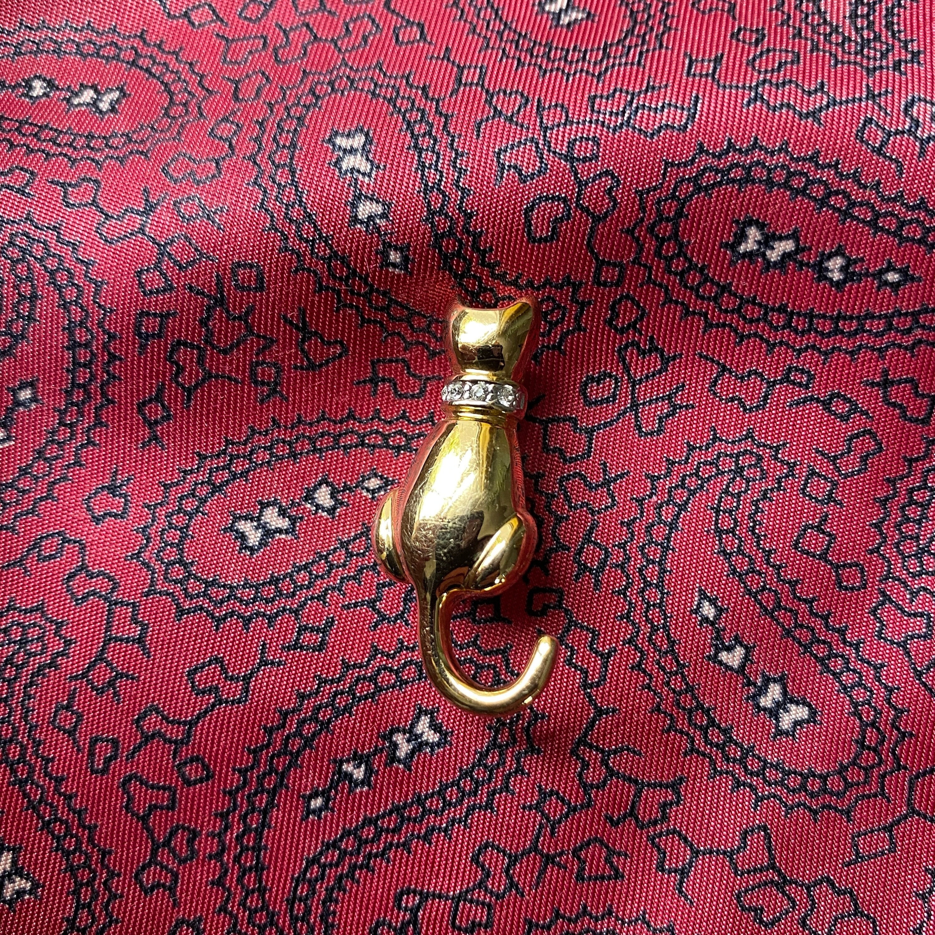 Vintage gold and silver tone diamanté cat brooch.