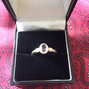 Beautiful vintage silver ring with a lilac amethyst gemstone. Size P. Weight 4.57g.