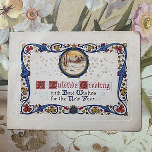 Vintage 1919 gebosseleerde en gedrukte kerstwenskaart.