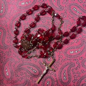 Beautiful vintage brass Rosary with red glass beads.