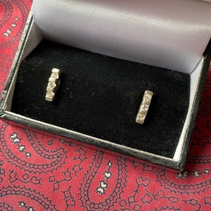 Stunning pair of vintage silver and cubic zirconia stud earrings. image 1