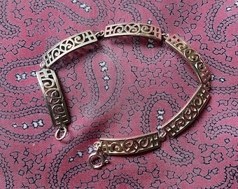 Vintage sterling silver bracelet in a Charles Rennie Mackintosh inspired design. 11.90g.