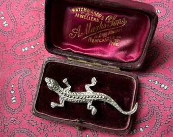 Broche vintage de lagarto de plata y marcasita. Peso 6,80g.