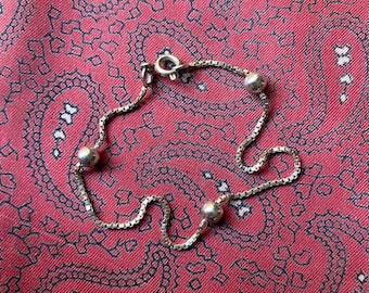 Vintage sterling silver cable chain bracelet with silver beads.
