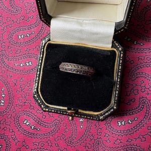 Beautiful vintage silver eternity ring with an array of marcasite stones. Size N. Weight 3.10g.