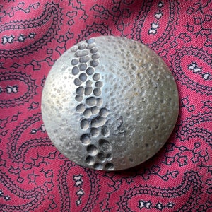 Vintage pewter circular brooch in a contemporary design.