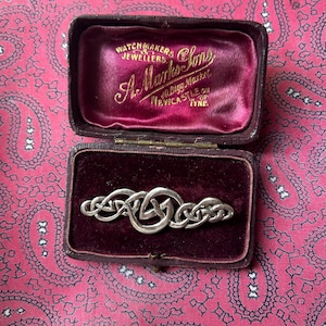 Vintage silver bar brooch in a Celtic design.