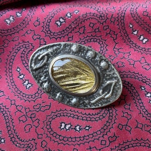 Vintage studio golden butterfly wing brooch.