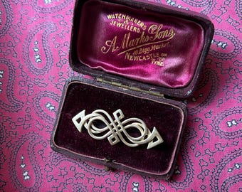 Striking vintage sterling silver bar brooch in a beautiful design by Ola Gorie.