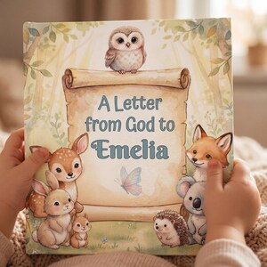 May include: A hardcover book cover featuring a central parchment scroll with the text A Letter from God to Emelia. The illustration includes a small owl, a deer, a rabbit, a squirrel, a fox, a koala, a hedgehog, and a butterfly in a forest.
