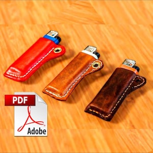May include: Three leather lighter cases in red, brown, and dark brown, each with a contrasting white stitch and a metal grommet. The lighters are visible inside the cases. The image also includes a PDF Adobe icon.