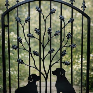 May include: Black metal garden gate featuring a tree and leaf design. Two dog silhouettes are at the base. The gate has a curved top with decorative finials. The gate is made of metal.