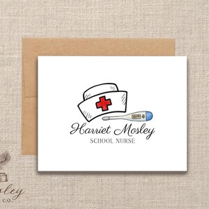 May include: A white card with a nurse's cap, red cross, and thermometer illustration. The card reads "Harriet Mosley, School Nurse" in elegant script. A brown envelope is behind the card.