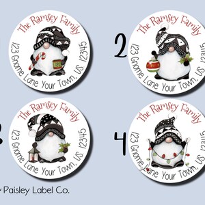May include: Four round white stickers with a black and white gnome illustration and the text "The Ramsey Family 123 Gnome Lane Your Town, US 12345" in red and black lettering.