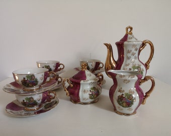 Tea Set 9 Pieces - Small Crockery - Teapot - Milk Jug - Sugar Jug - 6 Mugs - White with Cranberry color - Depiction of Victorian Lovers