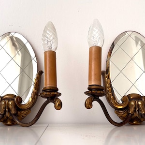 Pair of brass wall lamps with faceted oval mirror – Hollywood Regency – Art Deco – 2-Arm Wall Lighting
