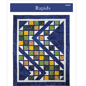 May include: A quilt with a blue background and a geometric pattern of white, yellow, green, and brown squares. The quilt is 61" x 77 1/2" and features the word "Rapids" at the top.