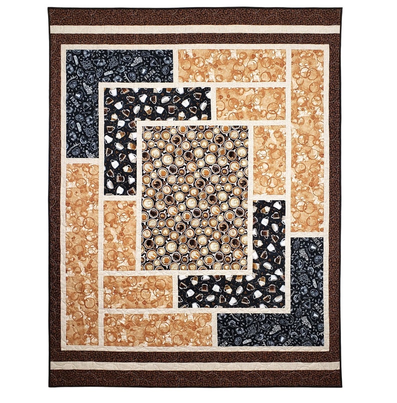 Sliding Screens Quilt.  Center panel featuring large-scale coffee themed print, bracketed by cream colored sashing and other coffee-themed fabrics in varying shades of brown.