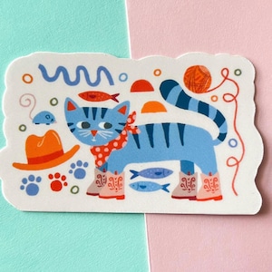 Cowboy Cat Vinyl Sticker | Cat in Cowboy Boots | Blue Striped Cat Sticker | Cat with Fish and Yarn | Laptop Decal