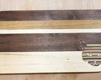 Custom cutting board with a skateboard inlay