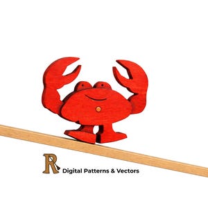 May include: A bright red wooden crab with a smiling face and large claws. The crab is balanced on a wooden beam. The image includes the text "R Digital Patterns & Vectors".