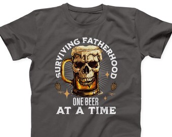 Funny Dad T-Shirt: Surviving Fatherhood Skull Beer Tee