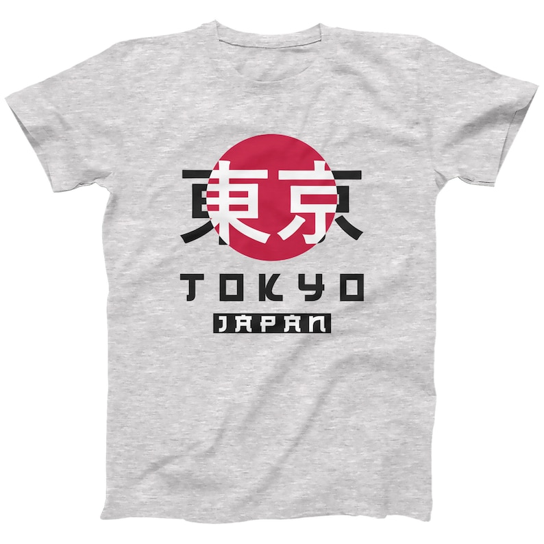 May include: A grey t-shirt with a red circle and black text that says "東京" in Japanese characters, "TOKYO" and "JAPAN".
