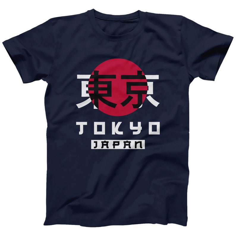 May include: A navy blue t-shirt with a red circle and the Japanese characters for Tokyo in black. The words "Tokyo" and "Japan" are printed in white below the circle.
