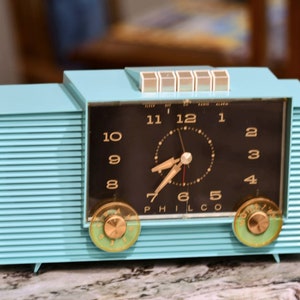 Rare gorgeous 1959 Philco Model H764 Clock Radio in Aqua Blue. Both Clock and Radio in perfect working order.