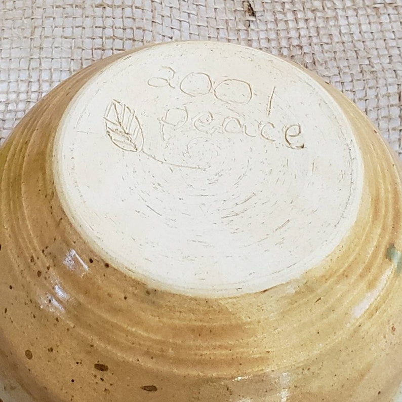 Handmade ceramic wheel thrown Peace Bowl Crafted in 2001.