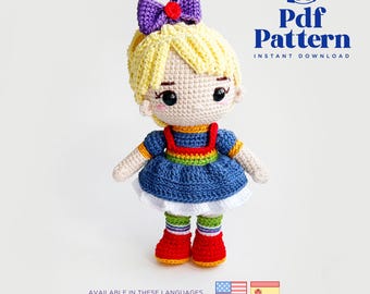May include: Crochet pattern for a doll with blonde hair, a rainbow dress, and red shoes. The pattern is available in English and Spanish.  Pdf Pattern Instant Download.