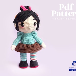 May include: Crochet amigurumi pattern for a girl doll with black hair, a blue shirt, a brown skirt, and striped stockings. The pattern is available as an instant download. The text "Pdf Pattern Instant Download" is visible in the image.
