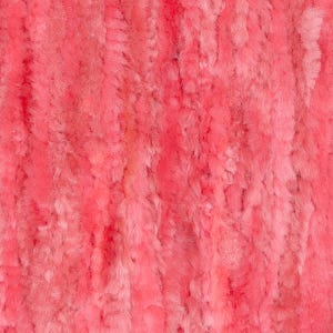 May include: Close-up of a vibrant, textured, coral-colored fabric. The material has a soft, plush appearance with vertical, slightly irregular lines, creating a sense of depth and dimension. The overall effect is warm and inviting.
