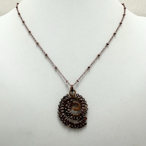 wire-wrapped ammonite inspired pendant necklace, ammonite necklace, beaded ammonite pendant, copper wire wrapped pendant necklace, ammonite