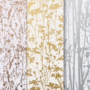 May include: Three wallpaper samples with floral patterns. The first has a white background with bronze botanical designs. The second has a cream background with gold floral elements. The third has a white background with silver botanical designs.