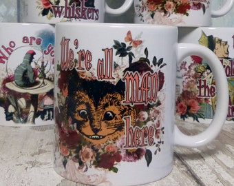 Alice in Wonderland Cheshire Cat quote mug "We're all mad here."